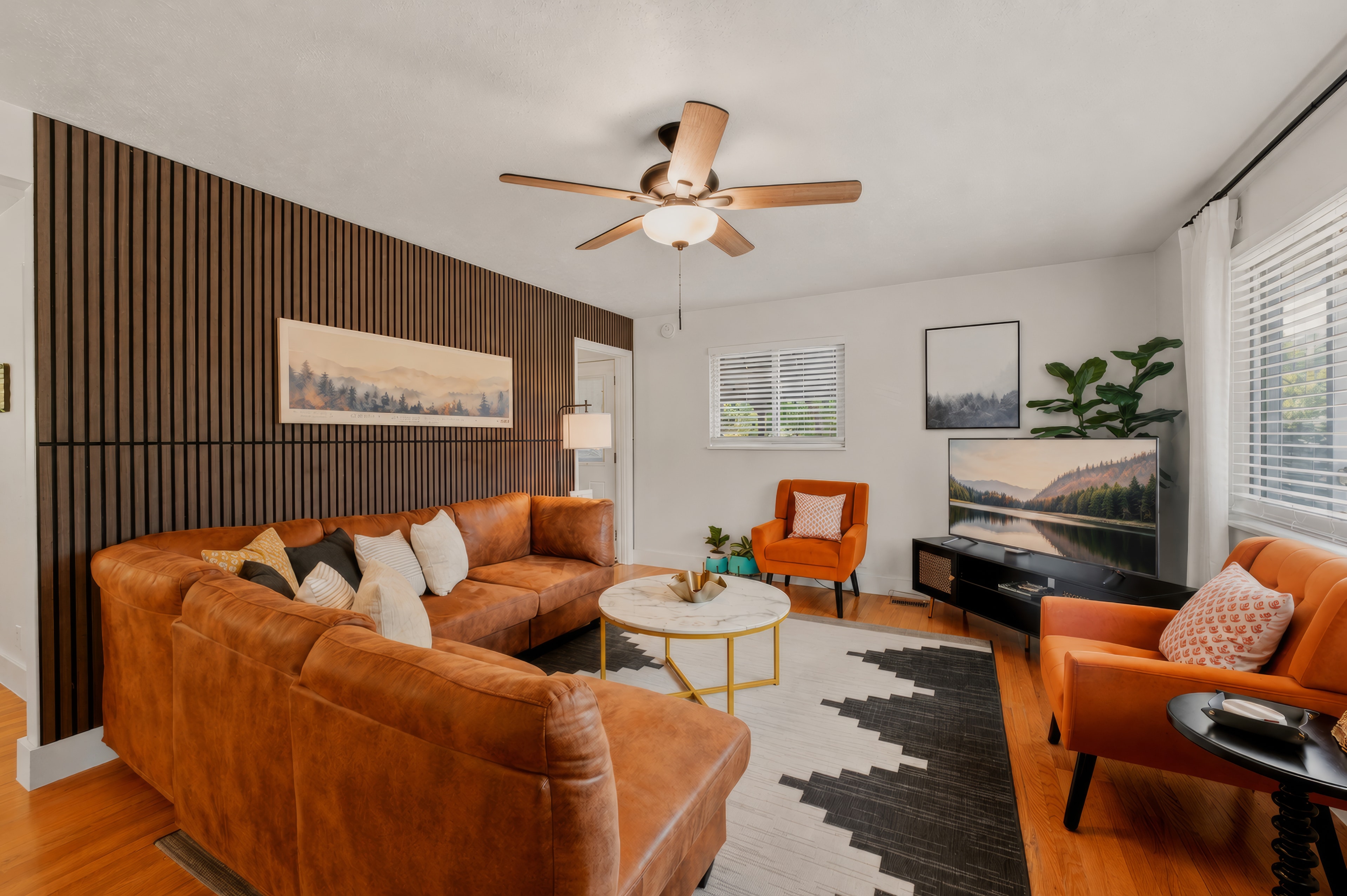 Modern living room with wood accent wall